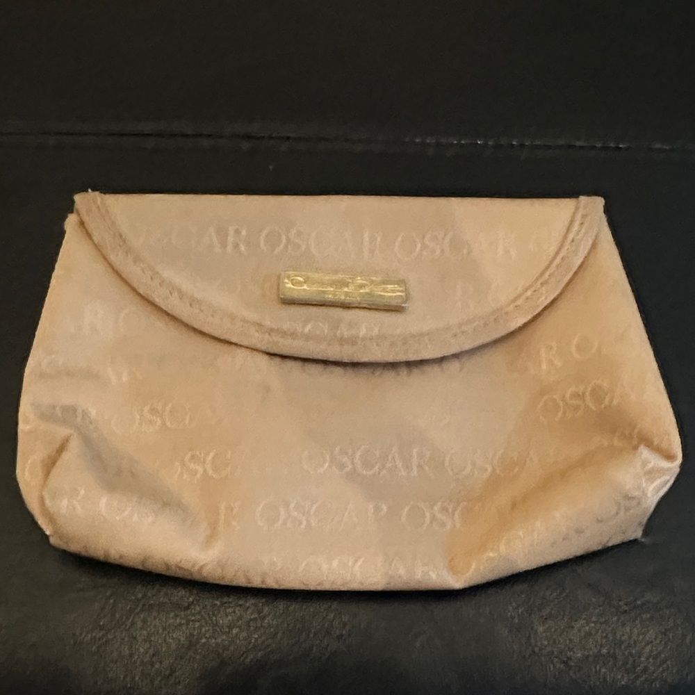 Oscar de la Renta Beige makeup case with Gold Accent